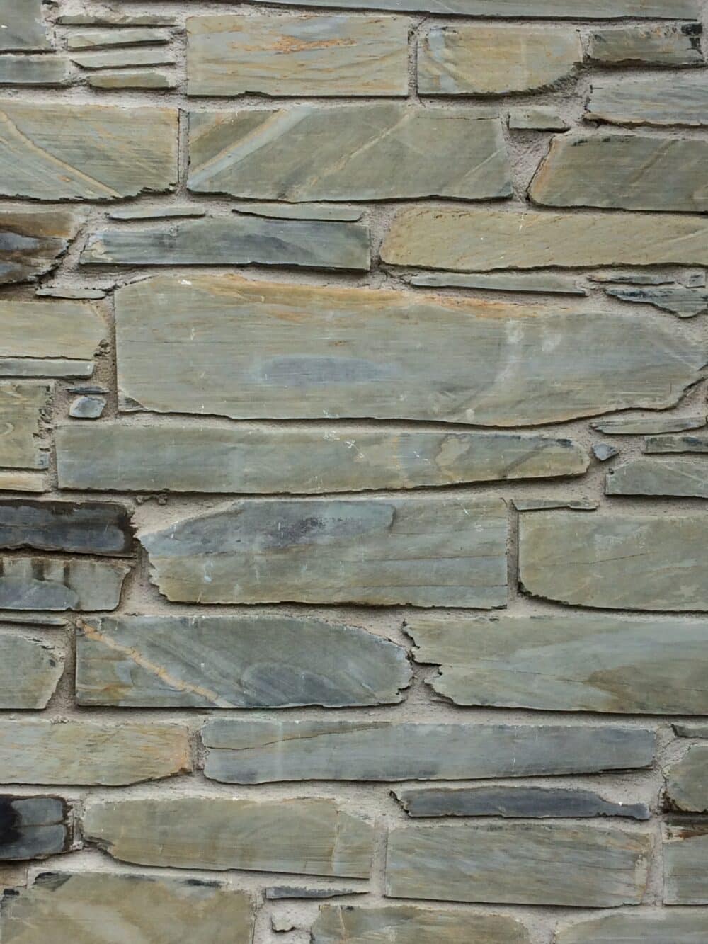 close up of blue grey sawn face stone