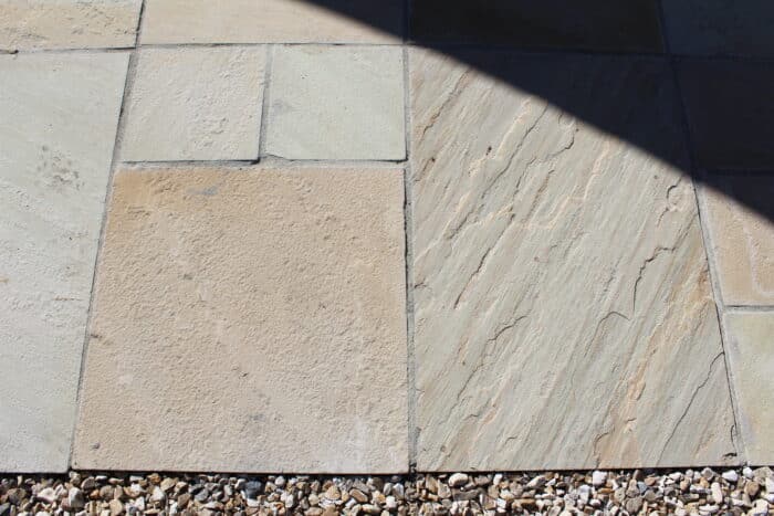 Buff sandstone paving