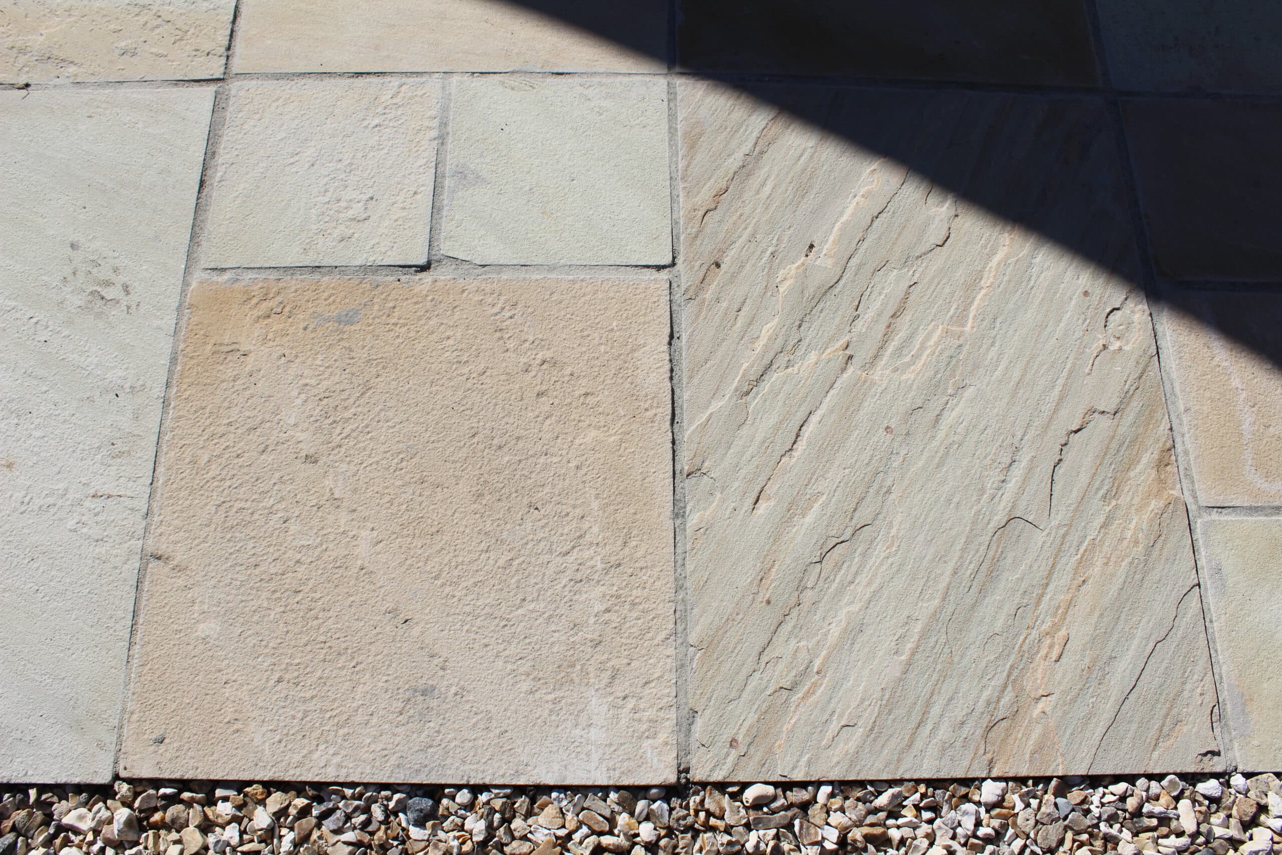 Buff sandstone paving