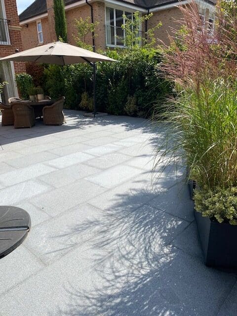 Dark grey granite paving