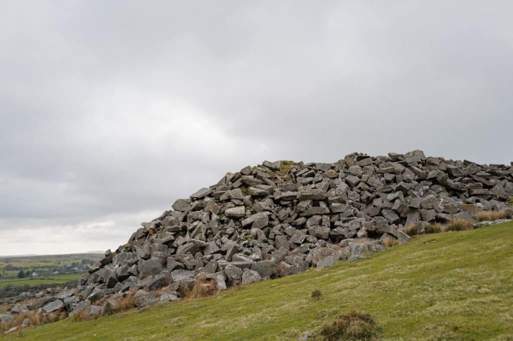 Caradon Quarry landscape showing stones set to be reclaimed as the quarry is restored